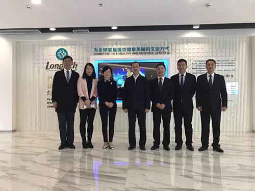 越秀区王焕清书记考察隆力奇亚洲区运营中心